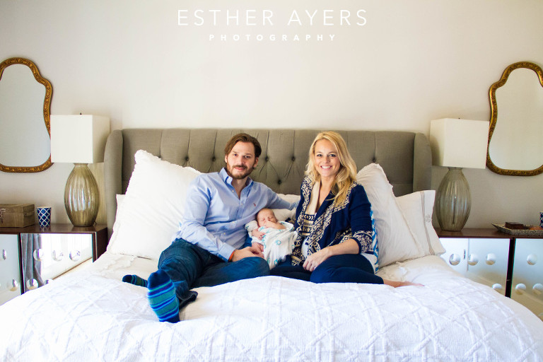beautiful family and first time parents with newborn baby boy - portrait session