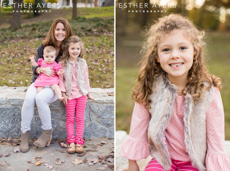 Beautiful mom and her two girls in a park at sunset