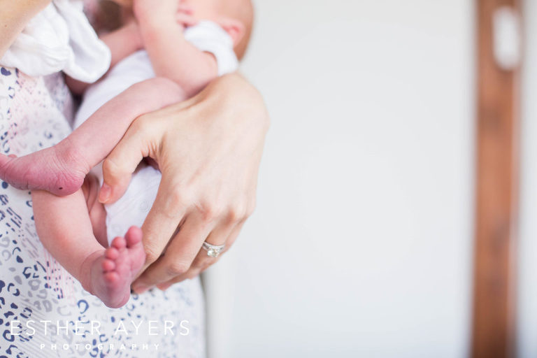 Newborn Baby Boy in Mother's Arms