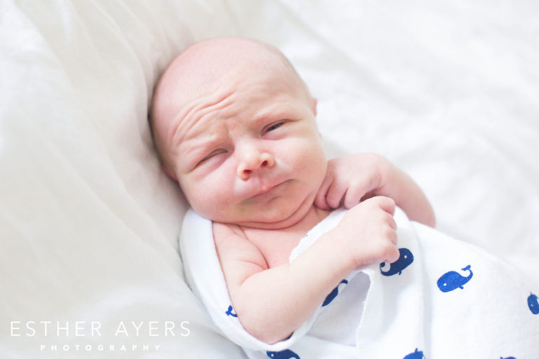 Newborn Baby Boy on Bed in Master Bedroom