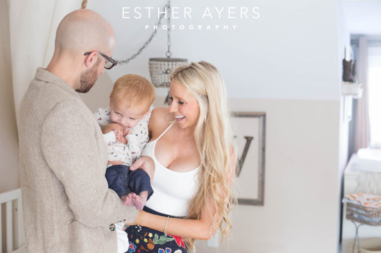 Newborn Baby Boy with Mom and Dad and big brother in Nursery