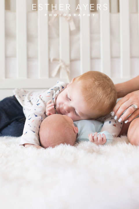 Newborn Baby Boy with big brother in Nursery