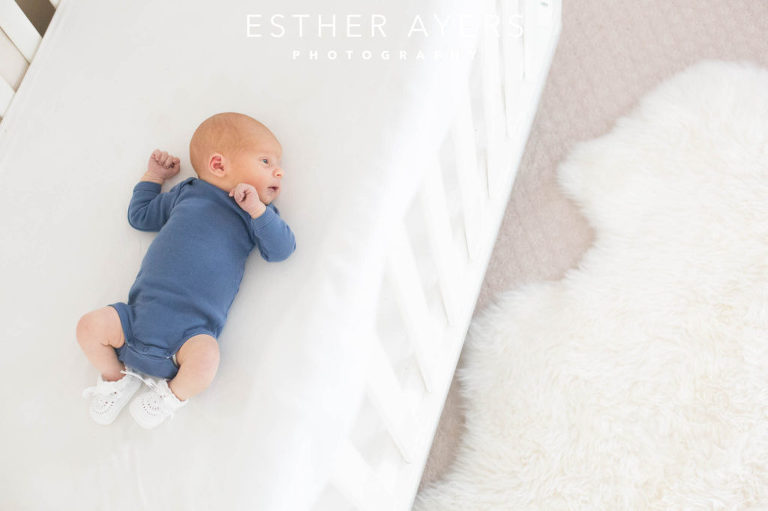 Newborn Baby Boy in Nursery Crib