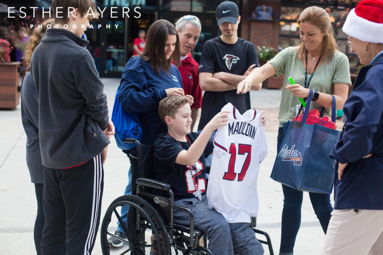 Dream on 3 kid with personalized baseball jersey at Atlanta Braves SunTrust Park