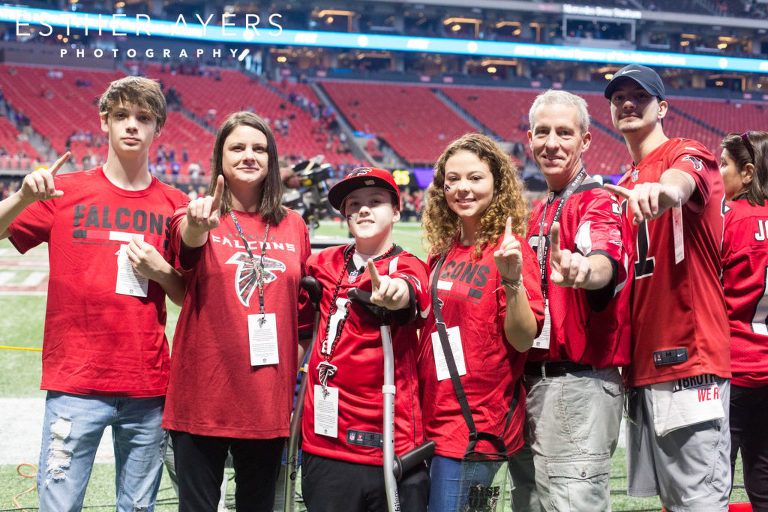 Dream on 3 Honorary Captain and family at Atlanta Falcons football game at Mercedes Benz Stadium