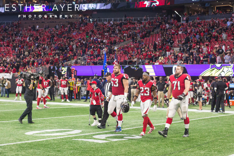 Atlanta Falcons football players during coin toss