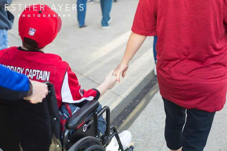 Son and mom holding hands