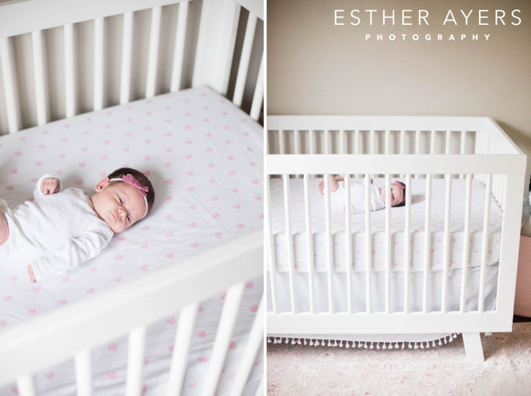 newborn baby girl in nursery and crib
